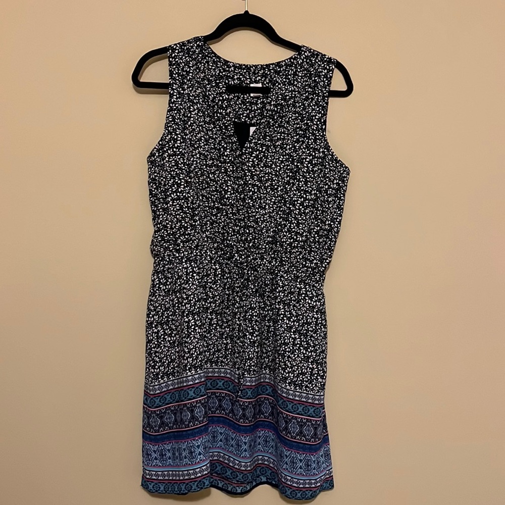 Medium sleeveless black and white dress with blue patterned bottom